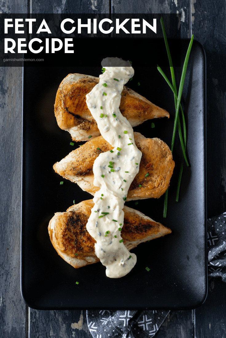Chicken and Feta sauce on platter with chives.