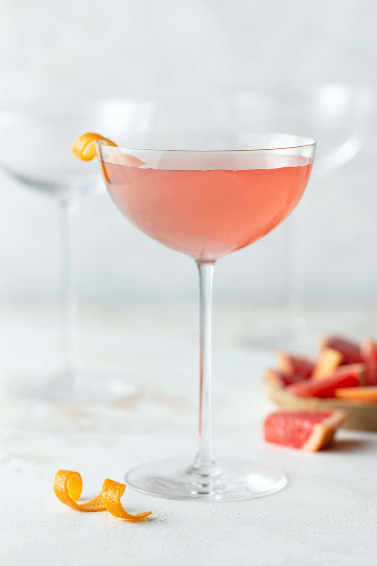 A glass of Grapefruit Martini.